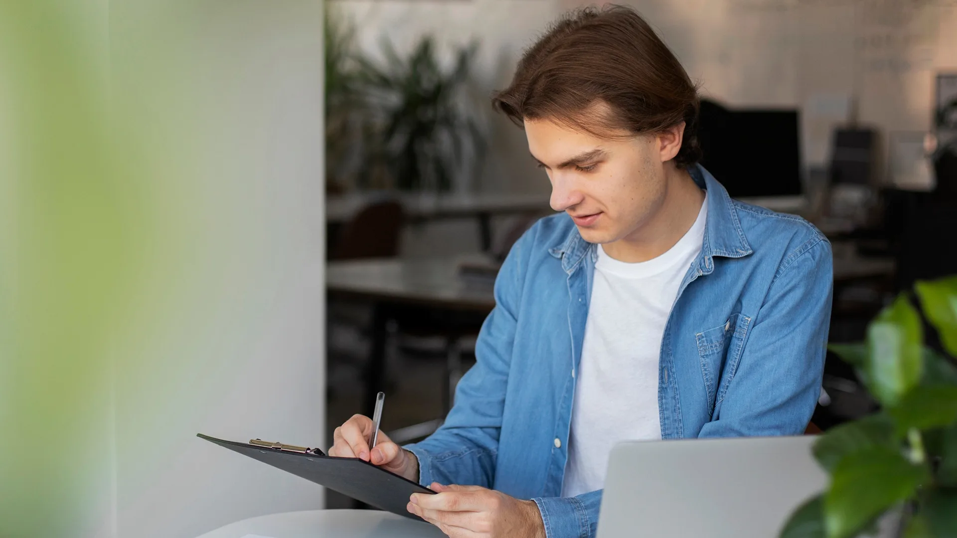 Customer reviewing personal car insurance documents