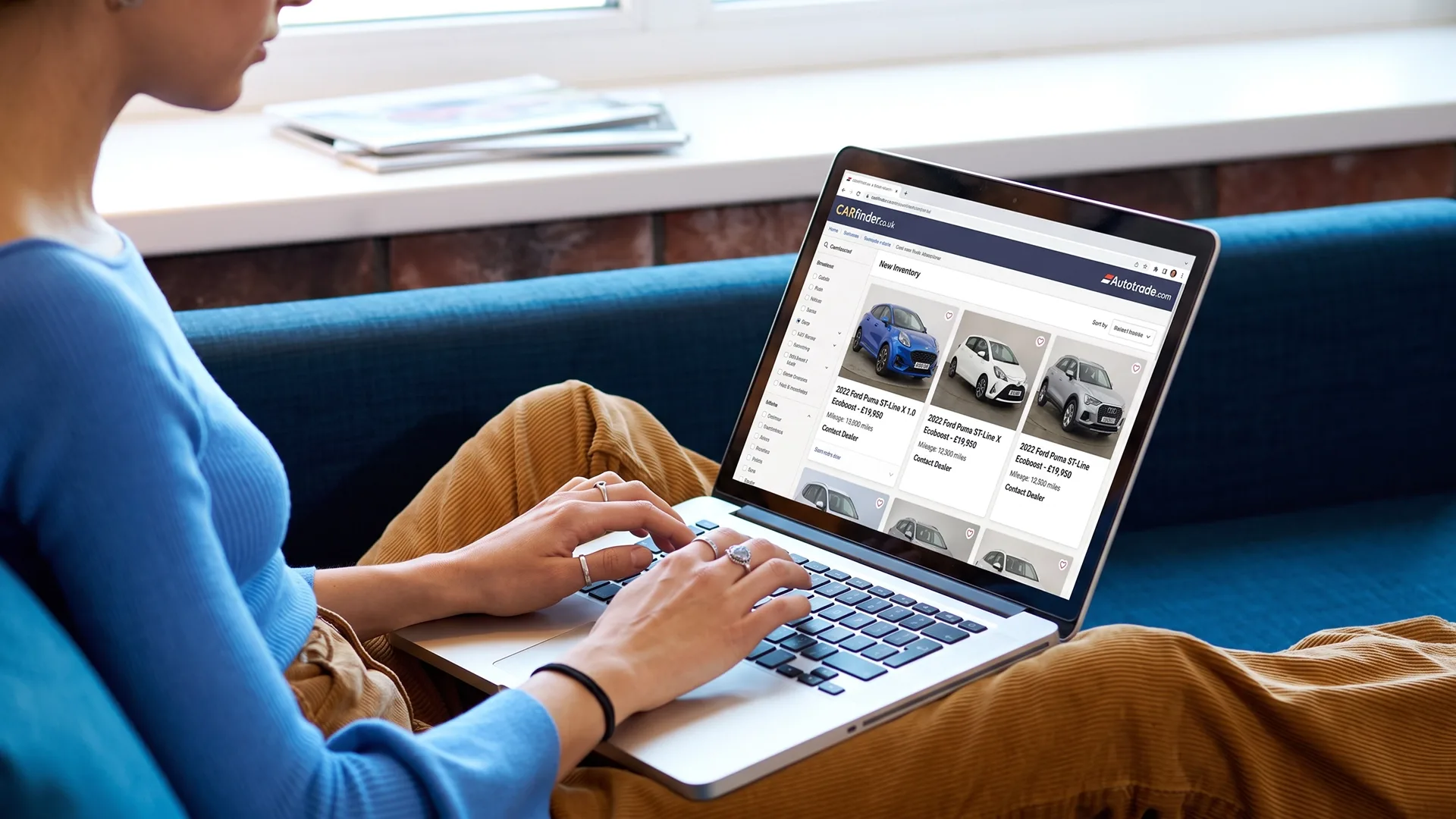 Buyer shopping for a car online before arranging auto transport