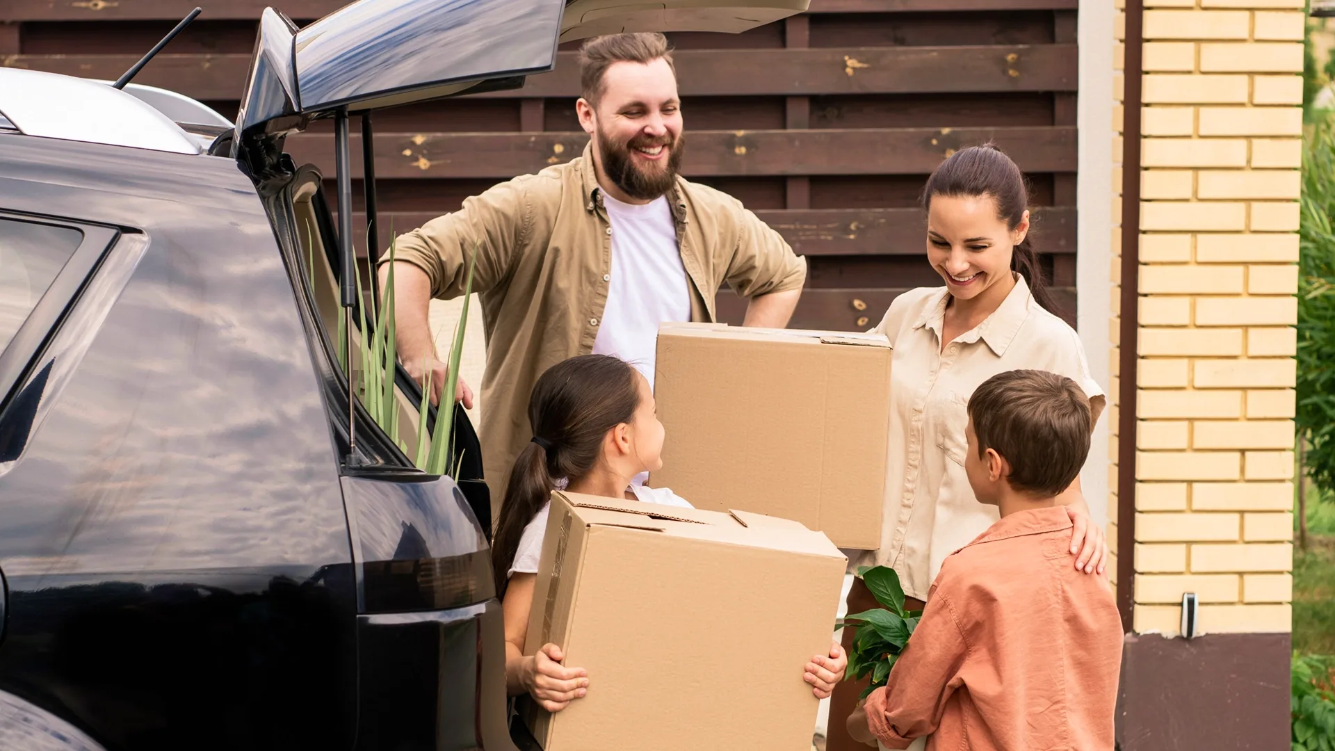 Family preparing for a car relocation move