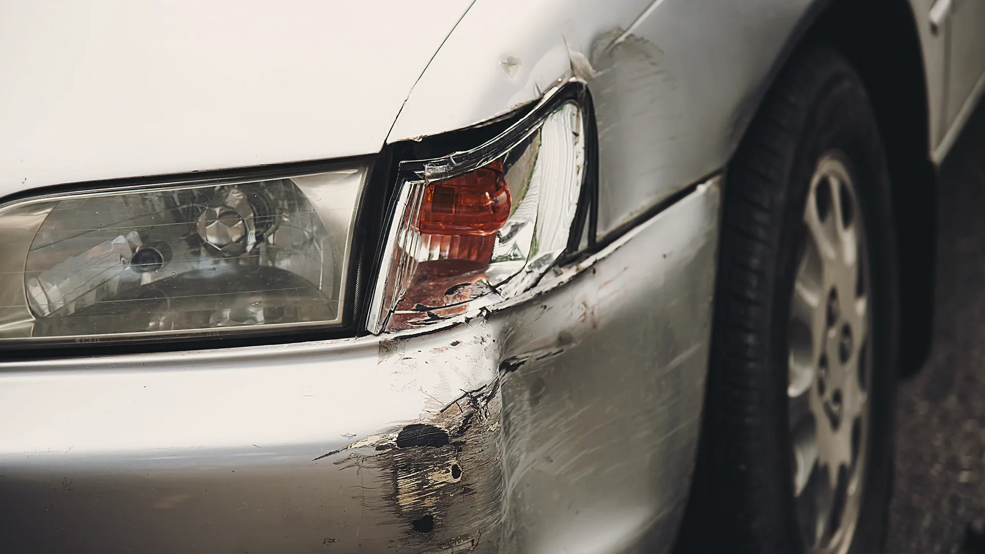 Car with visible accident damage affecting resale value