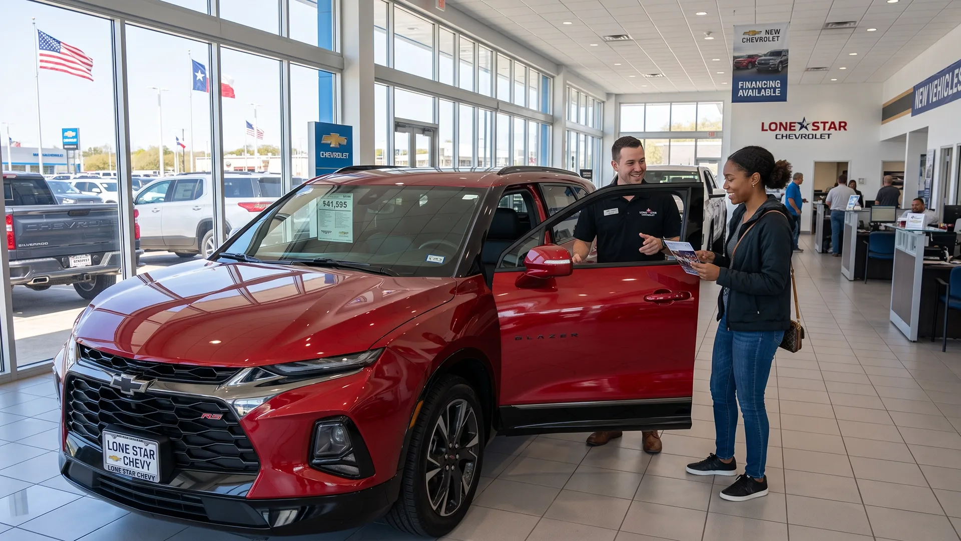Customer inspecting a red Chevrolet SUV with a salesperson at a car dealership