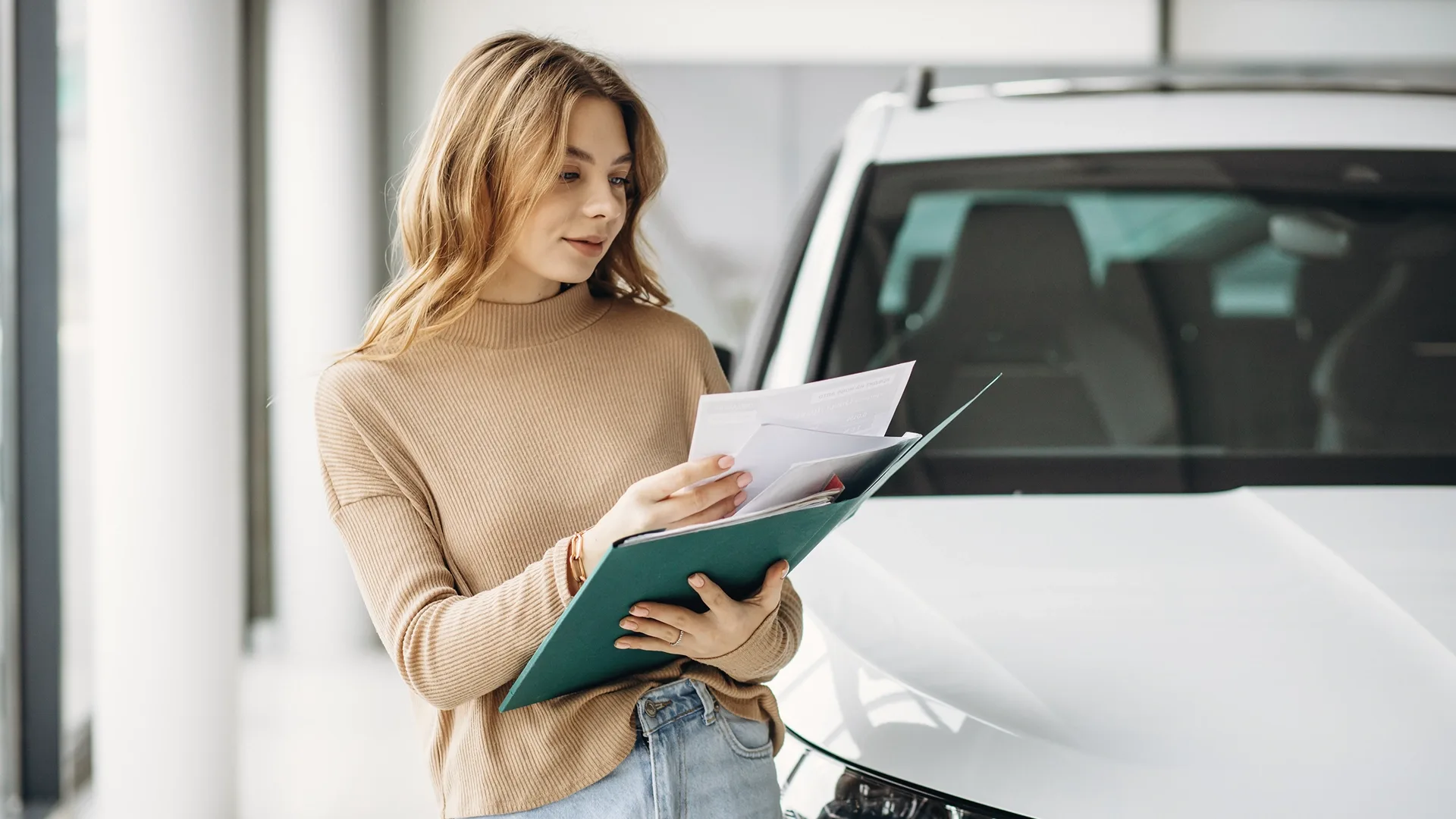 A transportation agency employee fills out the documents