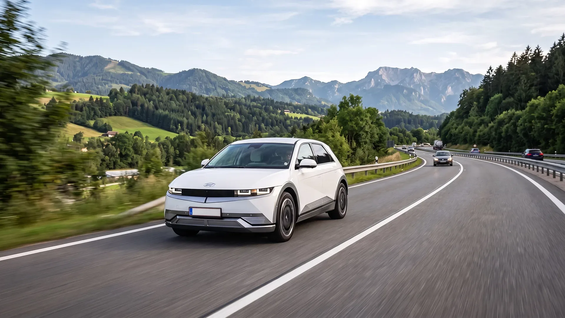 photo of electric vehicle driving on a highway