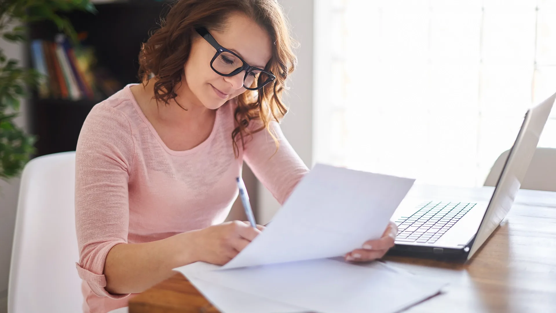 Customer reviewing moving insurance documents before transport