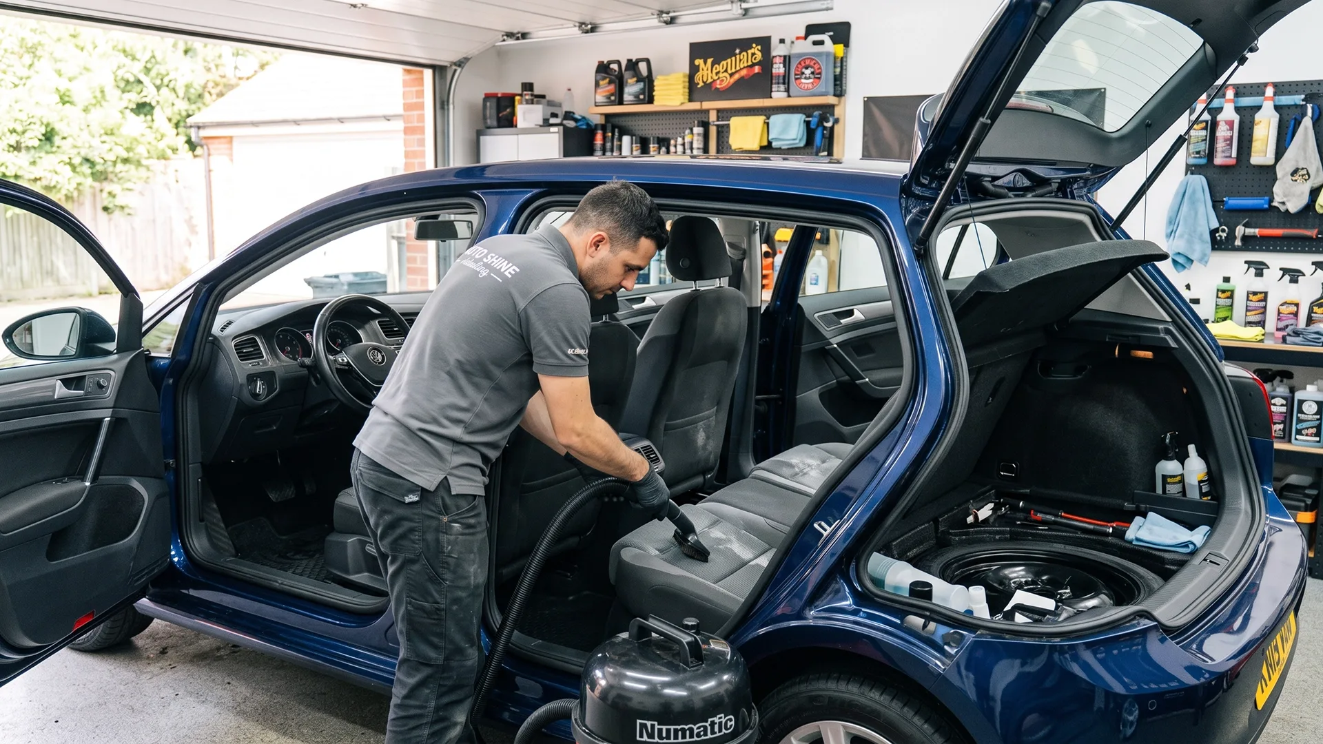 Car interior being cleaned before moving and vehicle shipping