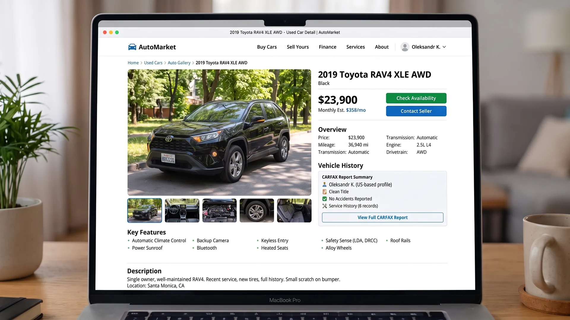 photo of used car listing displayed on laptop