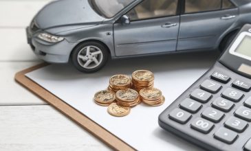 Car model calculator coins white table