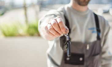 Man giving keys of the car
