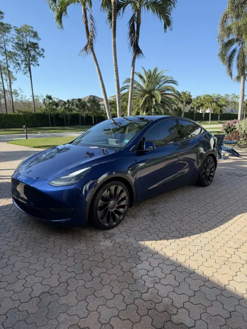 Elon Musk Celebrates World's First Autonomous EV Delivery, Tesla Critics Remain Skeptical image