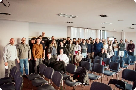Nexus Auto Transport staff attending a company-wide meeting