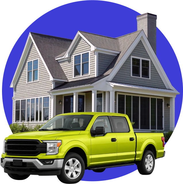 Car carrier collecting a vehicle from a residential driveway