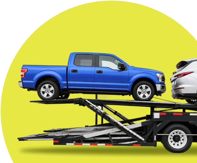 Pickup truck loaded onto an open car hauler